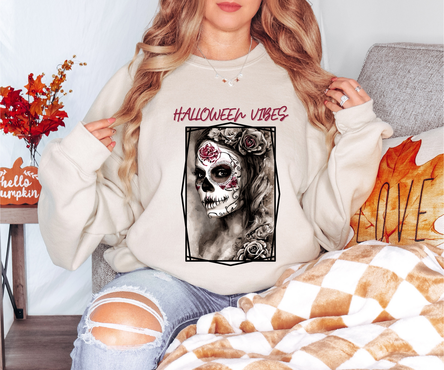 Explore our bewitching collection of Halloween sweatshirts, showcasing the mysterious allure of a Sugar-masked, Goth-style witch on the front.