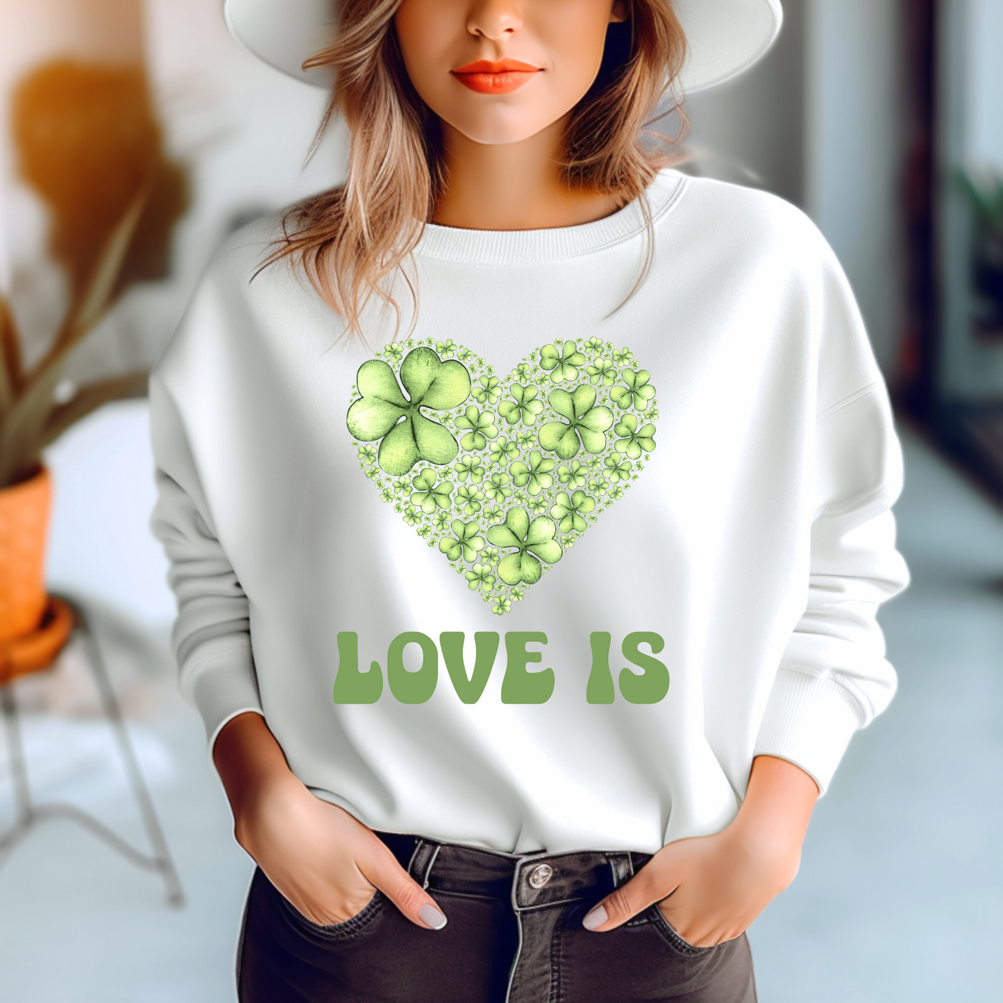 Embrace Love's Warmth: Introducing 'Love is' Gildan 18000 Sweatshirts - Whimsical Designs, Shamrock & Heart, Cozy Comfort, Thoughtful Sizing