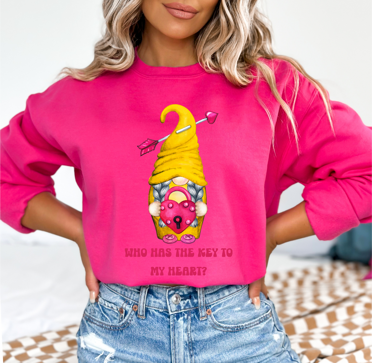 Embrace Love's Warmth: Introducing our Gnome with a Locked heart, 'Love is' Gildan 18000 Sweatshirts – Whimsical Designs, Cozy Comfort.