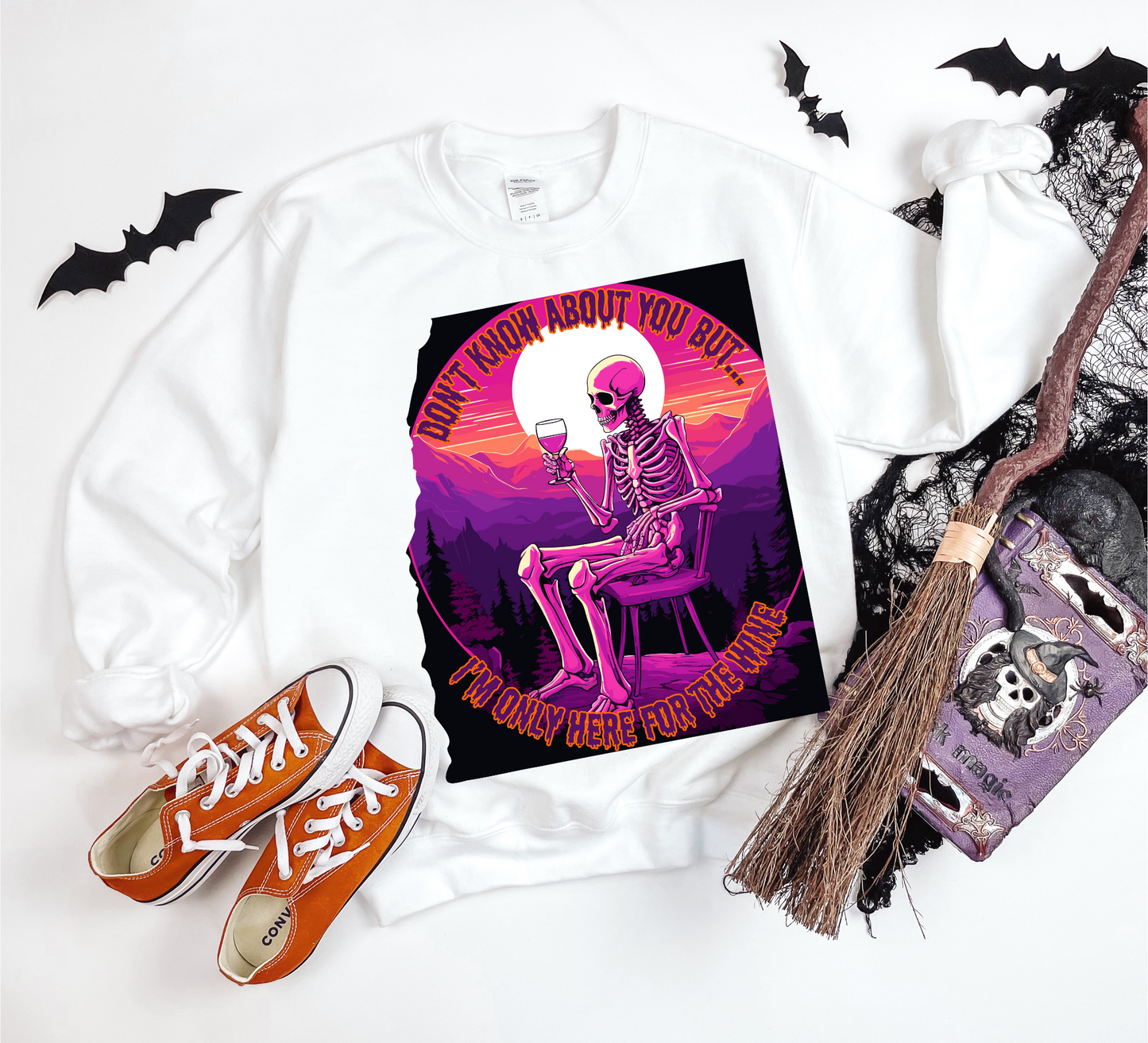 Explore our bewitching collection of Halloween sweatshirts, showcasing the mysterious allure of a drinking skeleton on the front.