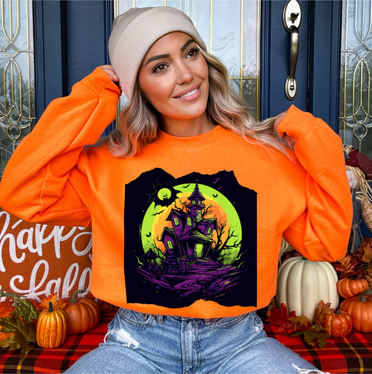 Explore our bewitching collection of Halloween sweatshirts, showcasing the mysterious allure of a haunted house on the front.