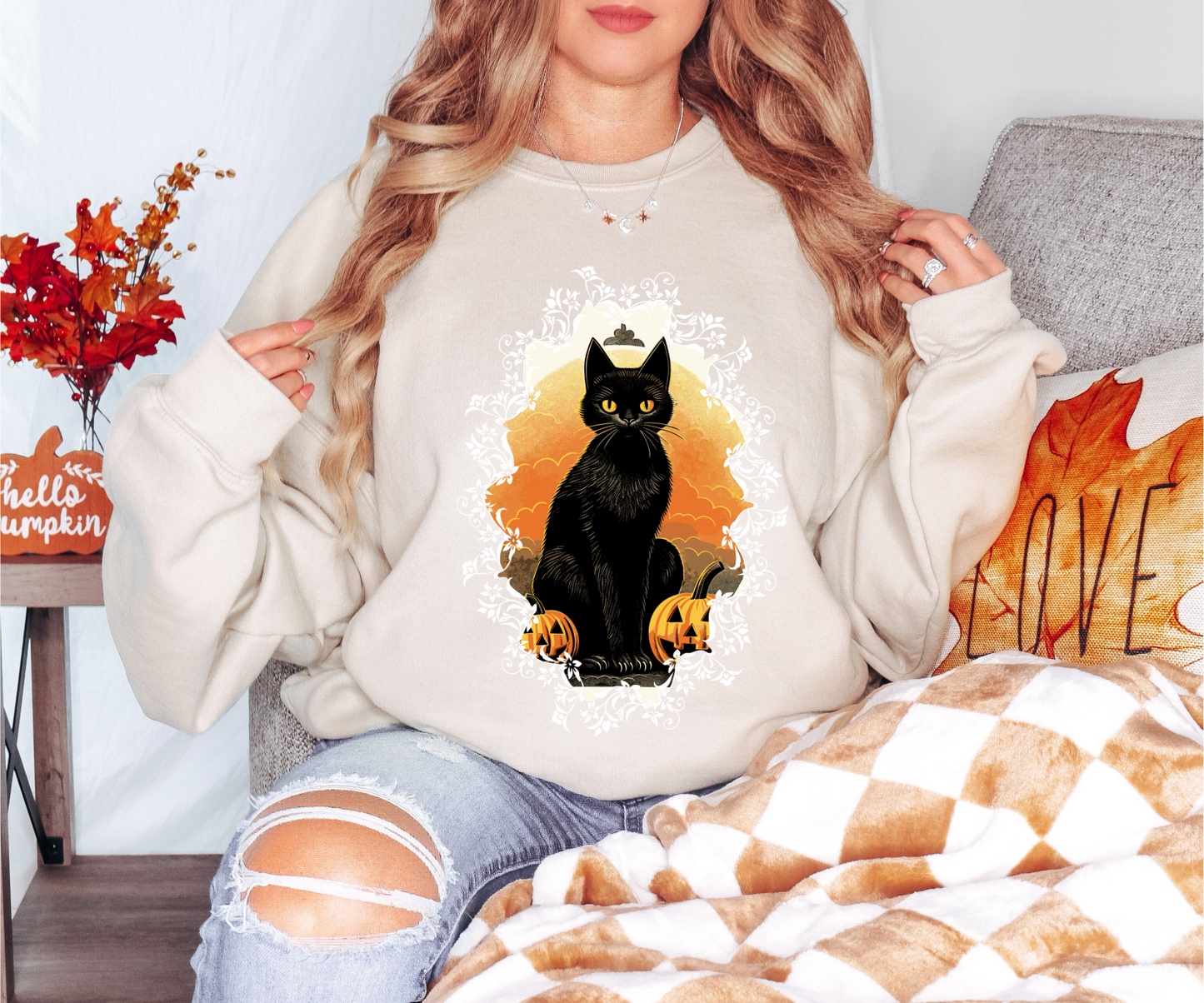 Explore our bewitching collection of Halloween sweatshirts, showcasing the mysterious allure of a black cat on the front.