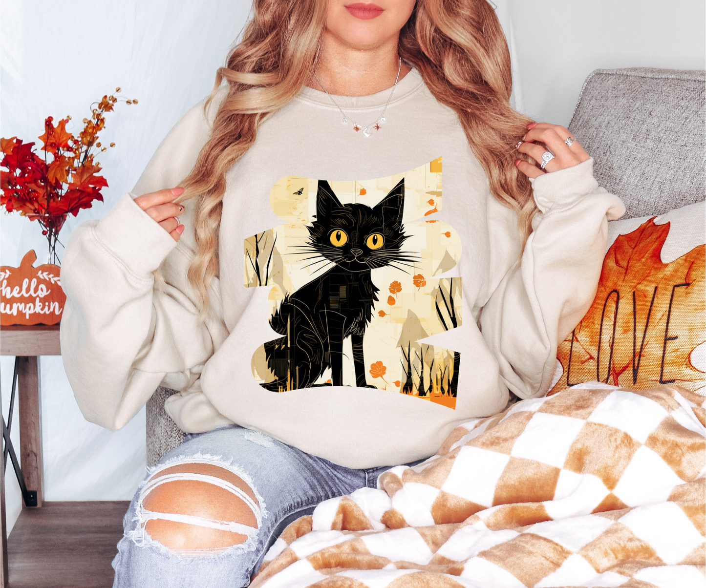 Explore our bewitching collection of Halloween sweatshirts, showcasing the mysterious allure of a black cat on the front.Sh