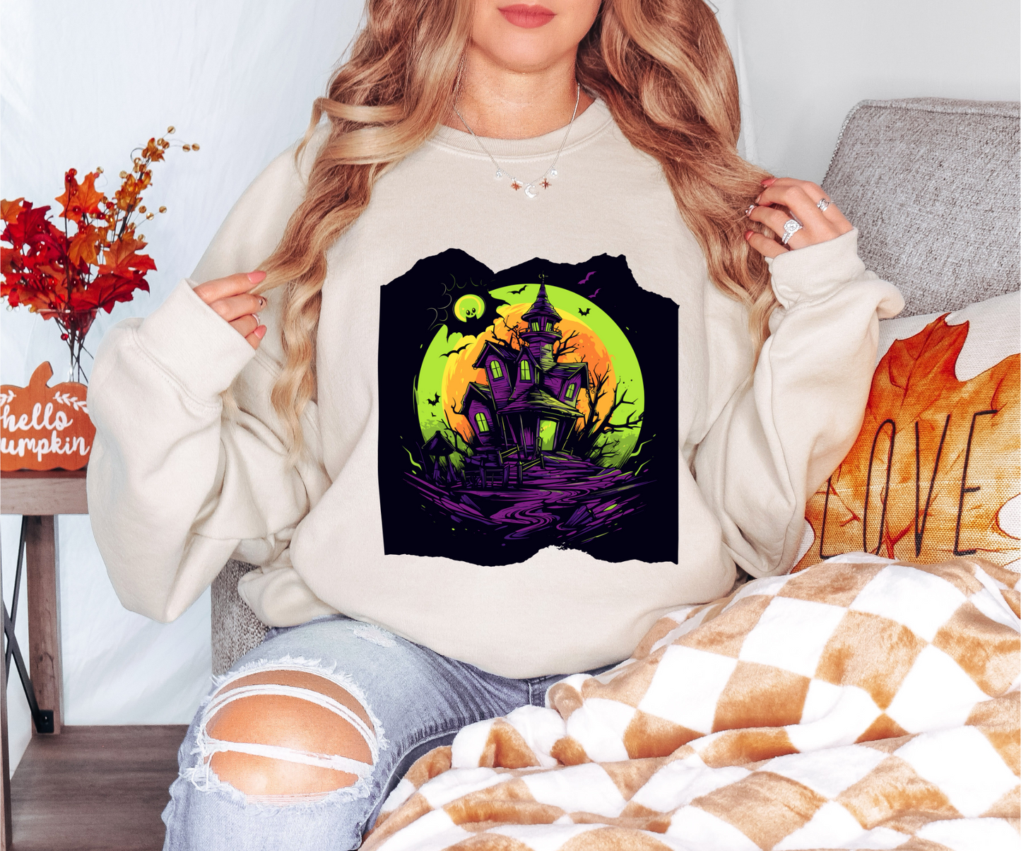 Explore our bewitching collection of Halloween sweatshirts, showcasing the mysterious allure of a haunted house on the front.