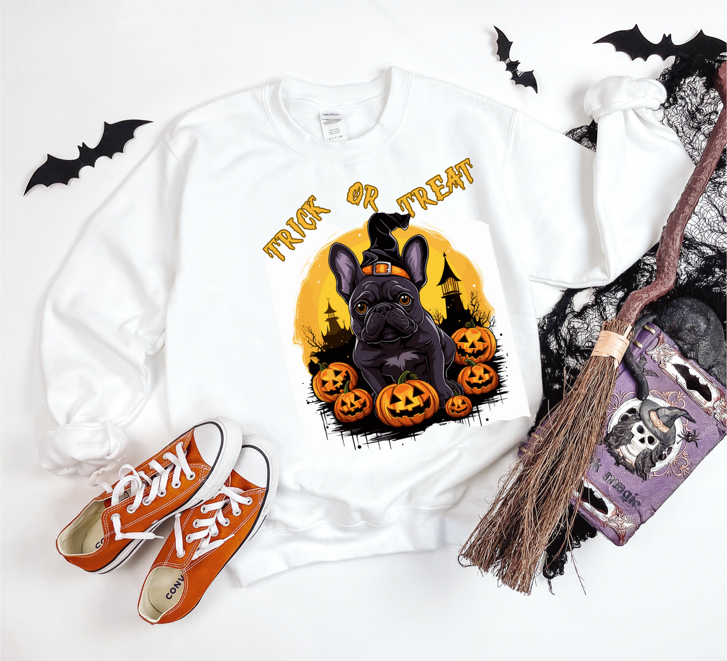 Explore our bewitching collection of Halloween sweatshirts, showcasing the mysterious allure of a French bull dog on the front.