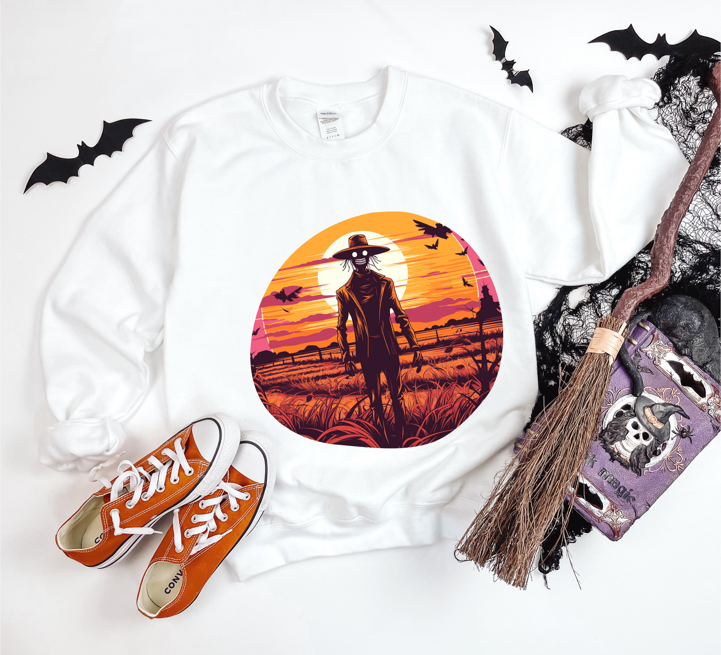 Explore our bewitching collection of Halloween sweatshirts, showcasing the mysterious allure of a scarecrow on the front.