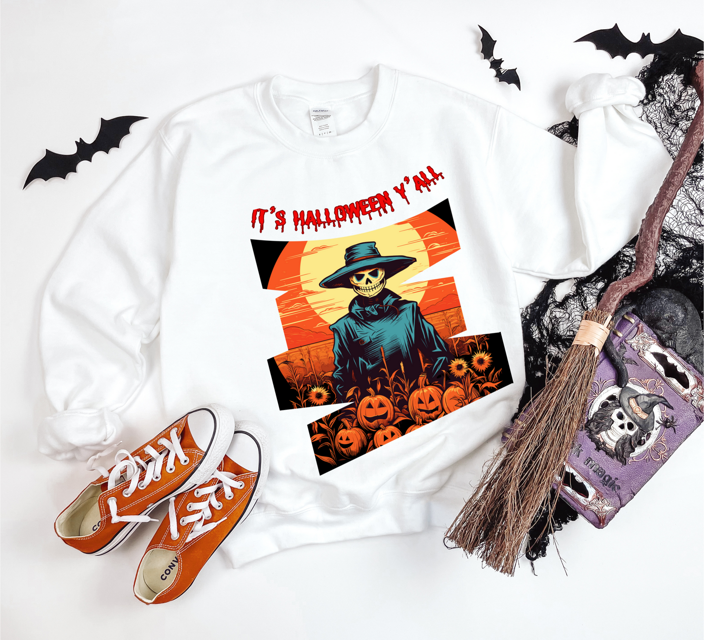 Explore our bewitching collection of Halloween sweatshirts, showcasing the mysterious allure of a Scarecrow on the front.