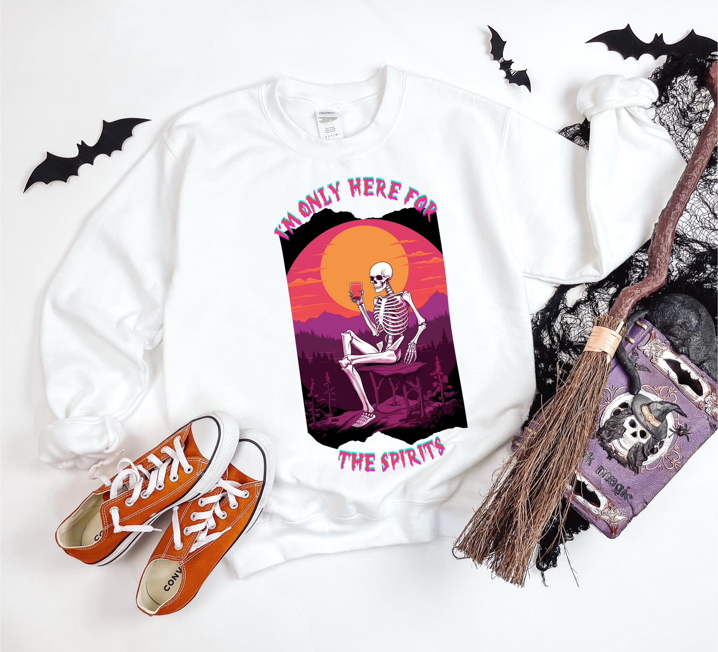 Explore our bewitching collection of Halloween sweatshirts, showcasing the mysterious allure of a drinking skeleton on the front.