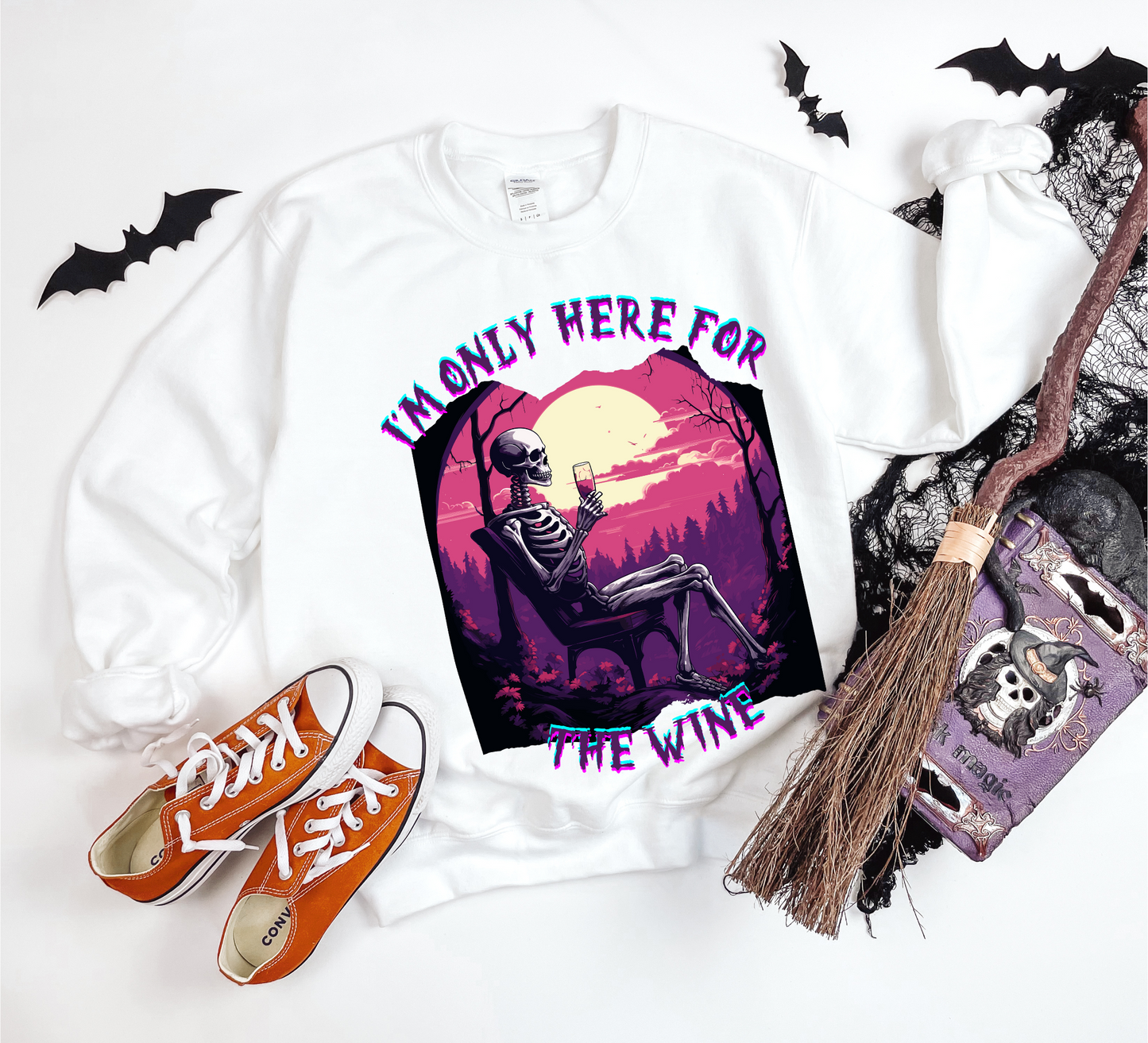 Explore our bewitching collection of Halloween sweatshirts, showcasing the mysterious allure of a drinking skeleton on the front.