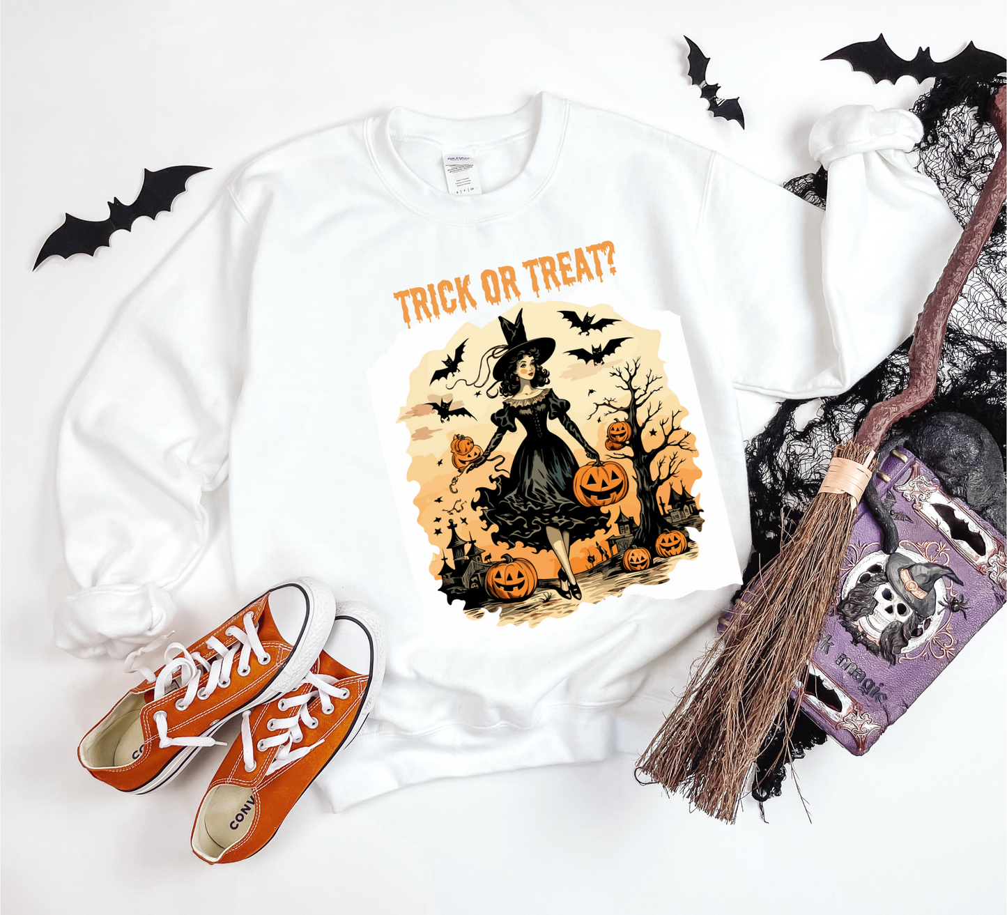 Explore our bewitching collection of Halloween sweatshirts, showcasing the mysterious allure of a witch on the front.