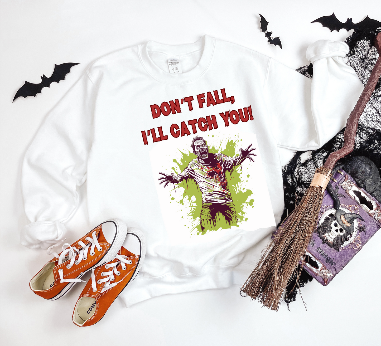 Explore our bewitching collection of Halloween sweatshirts, showcasing the mysterious allure of a zombie on the front.