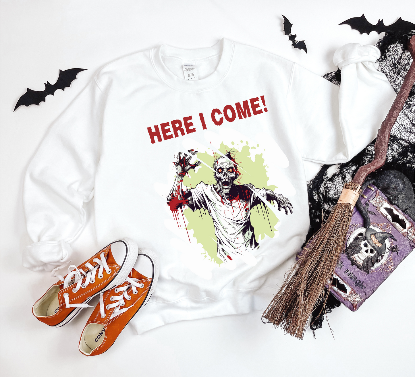 Explore our bewitching collection of Halloween sweatshirts, showcasing the mysterious allure of a zombie on the front.