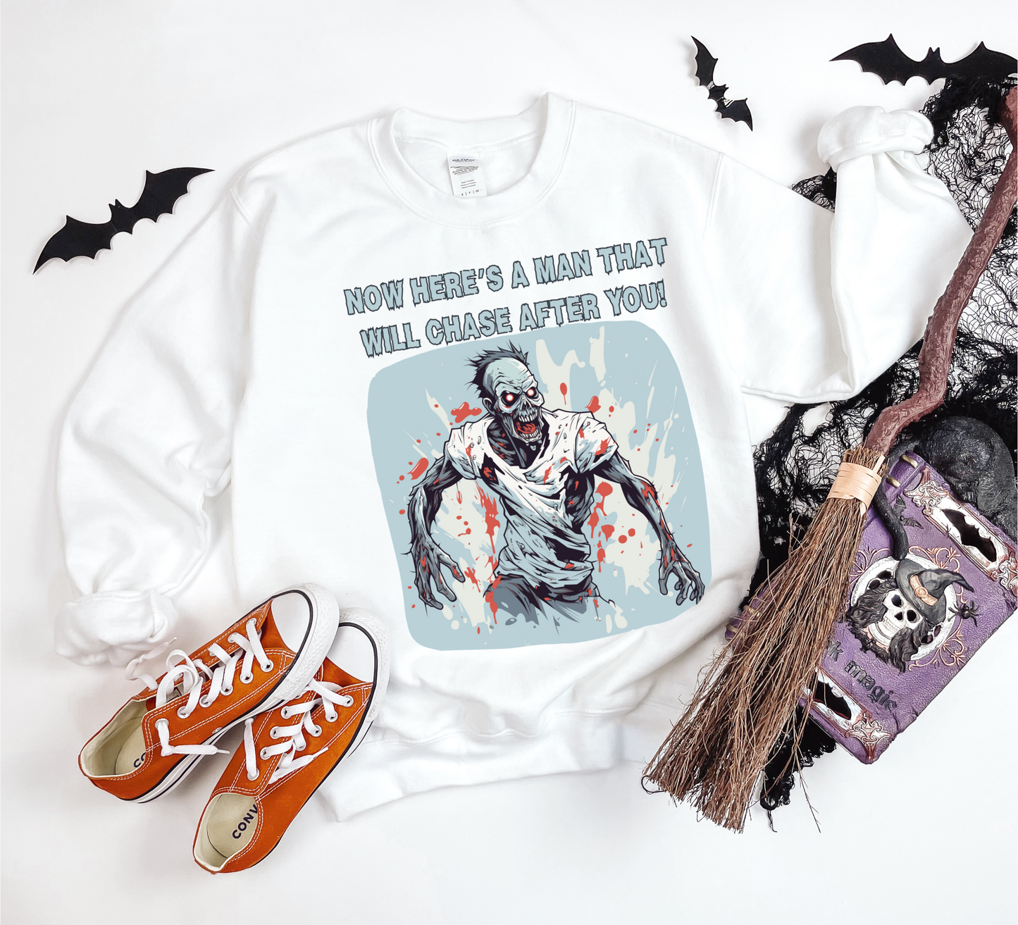 Explore our bewitching collection of Halloween sweatshirts, showcasing the mysterious allure of a zombie on the front.