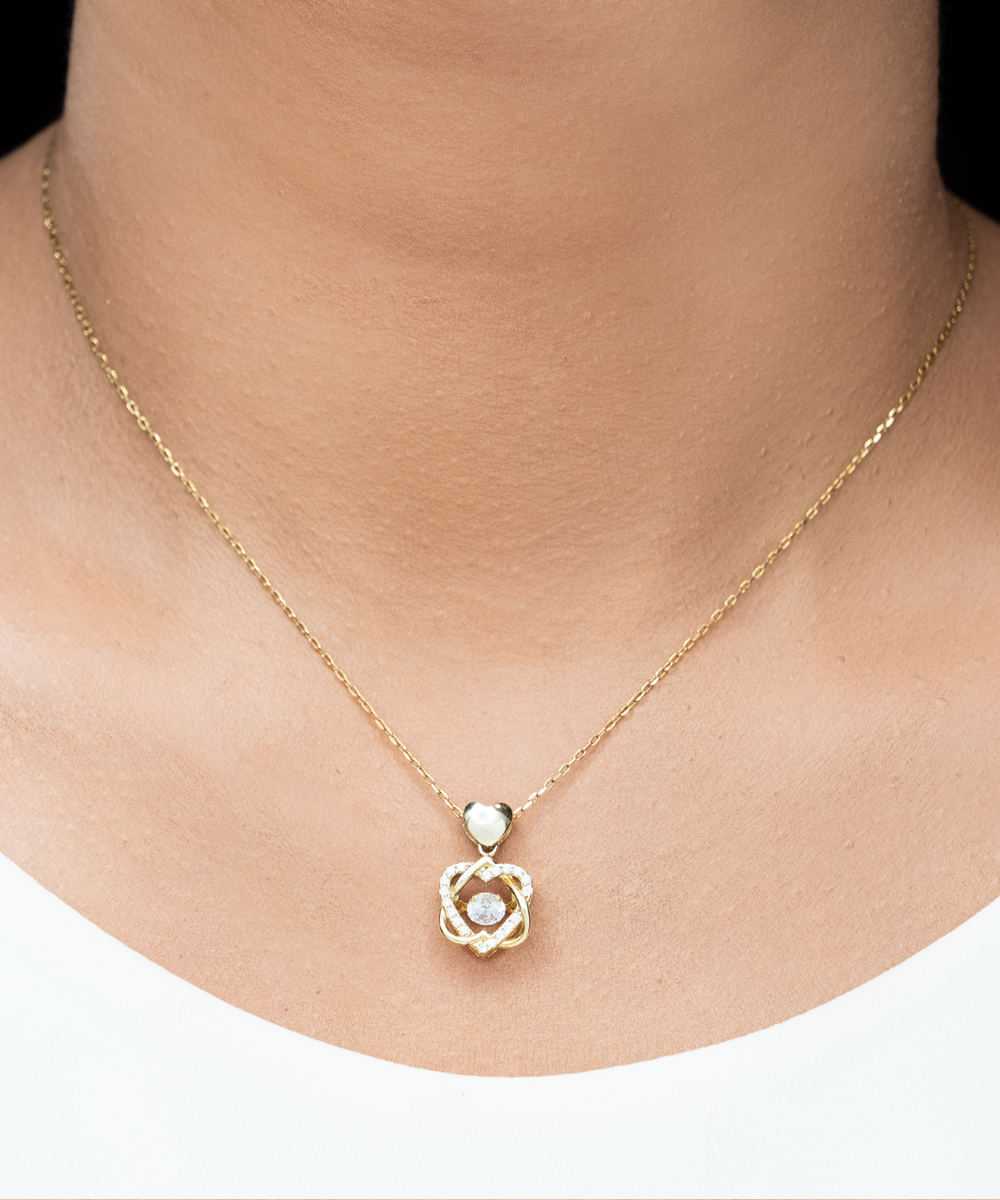 Our Heart Knot gold necklace beautifully symbolizes the hearts of two people who share a bond that can never be broken; Heart Knot Gold, Heart Knot Silver, Love Knot Rose Gold, Love Knot Silver, Solitaire Crystal, Double Crystal Circle.